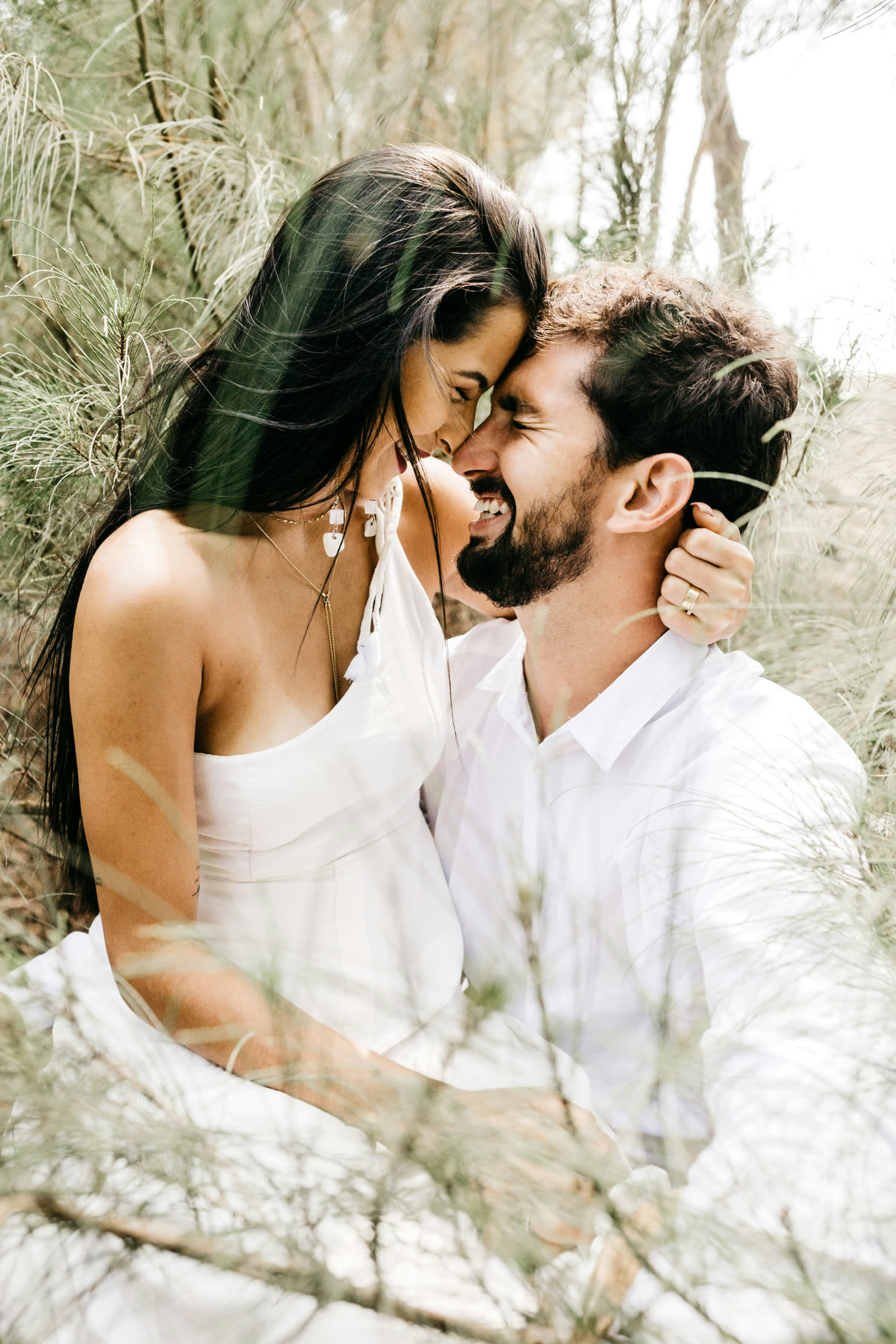Close, candid moment of a couple laughing together